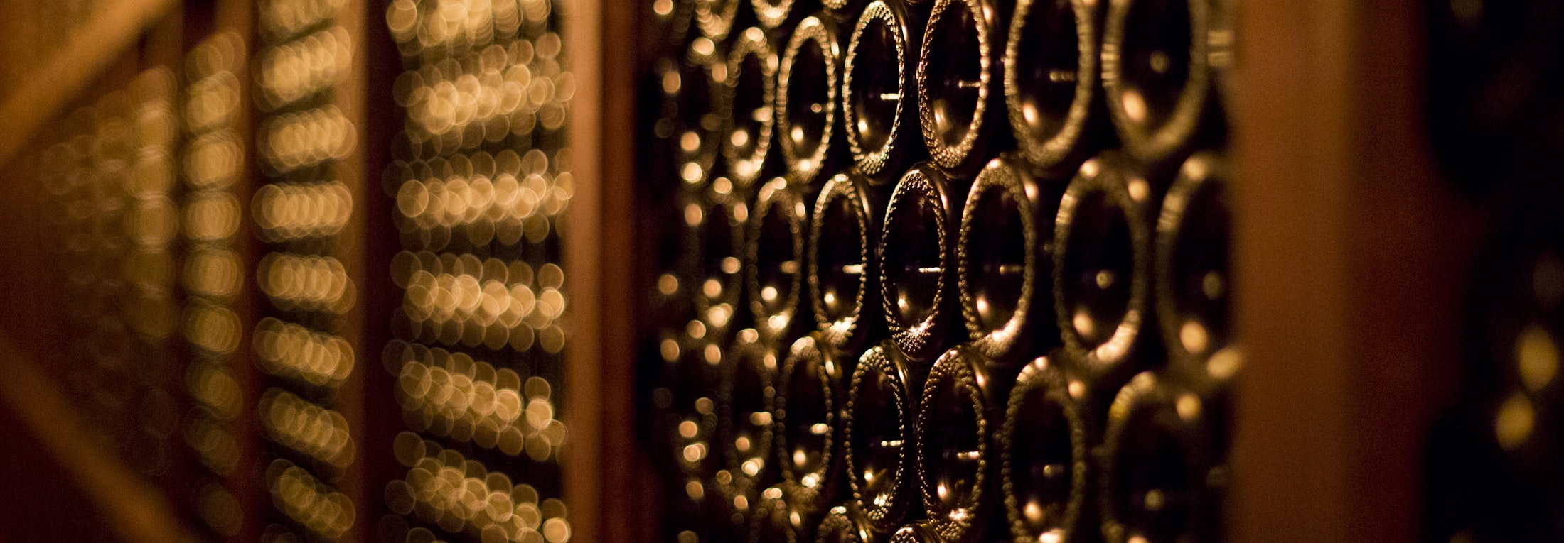 Shelves full of bottles stacked high