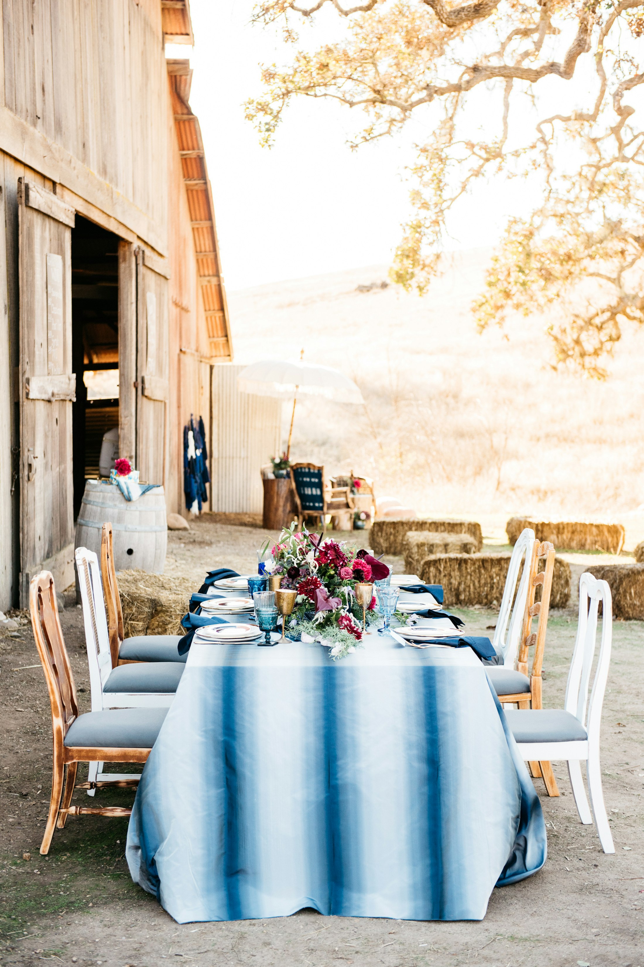 A table set outside the barn