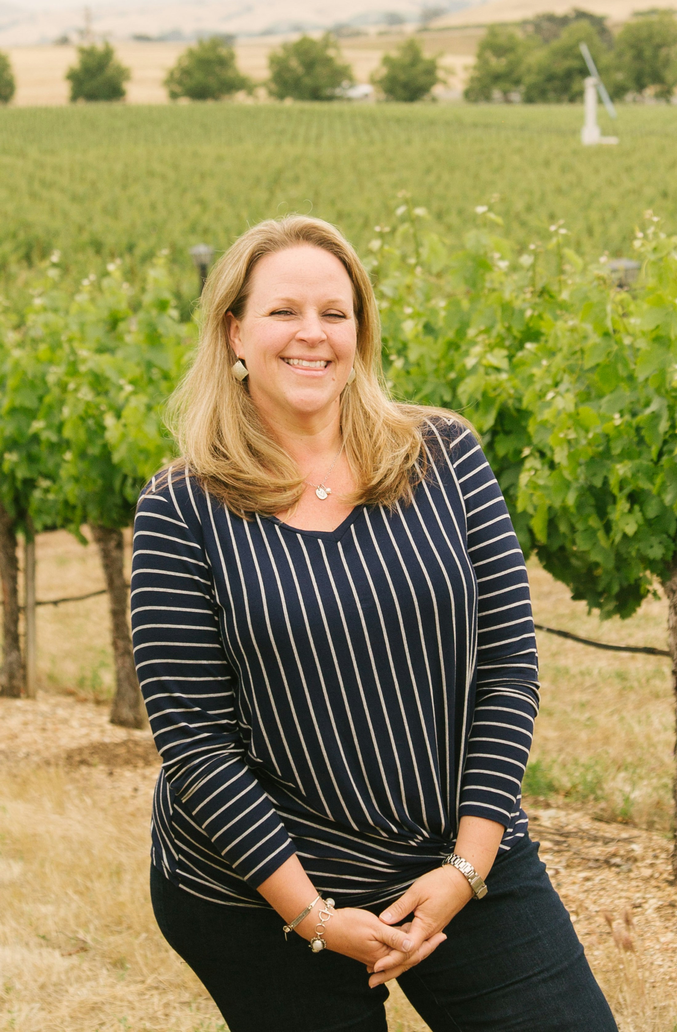 Lisa Kekuewa in the vineyard