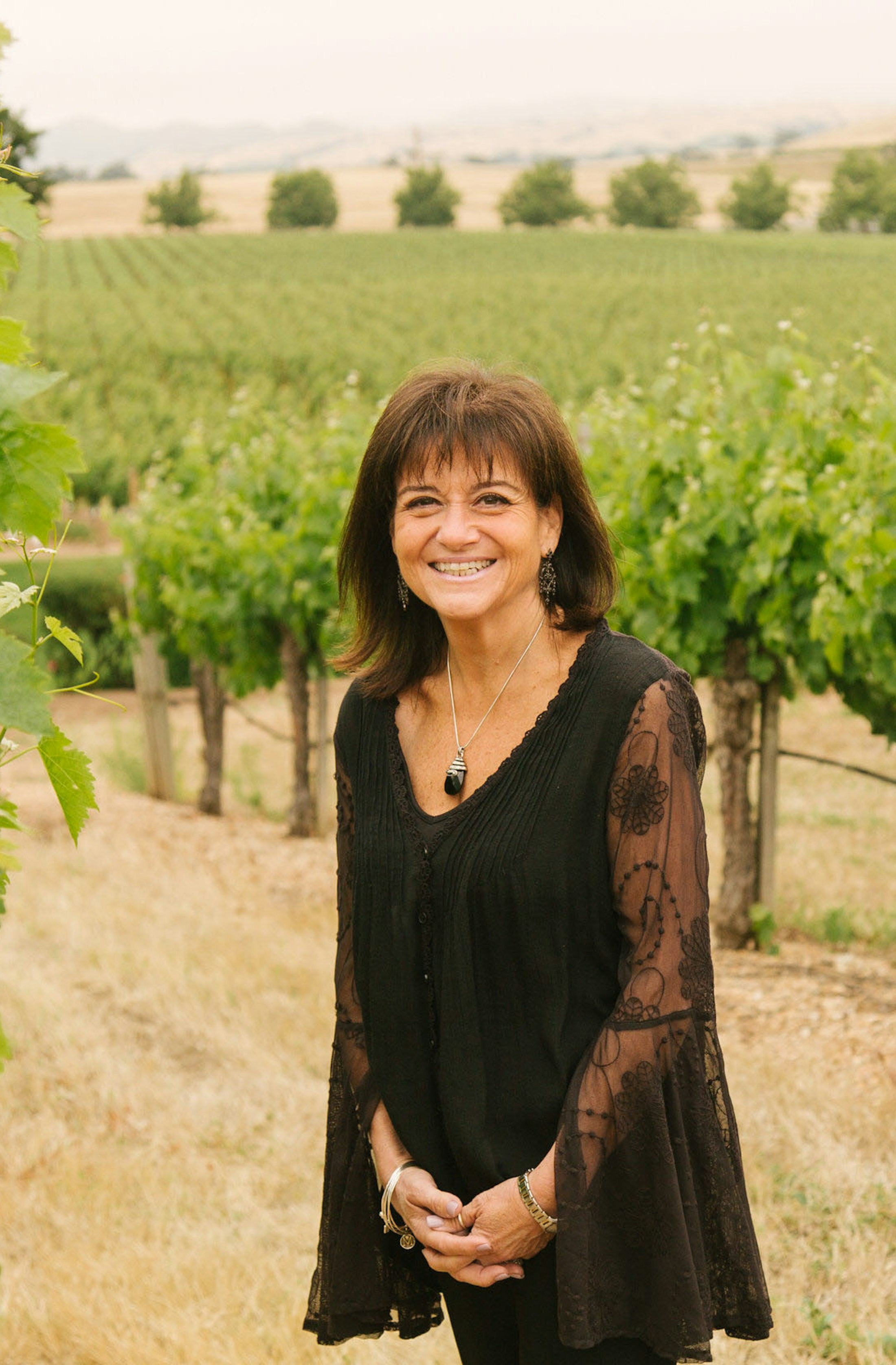 Meryl Capone in the vineyard